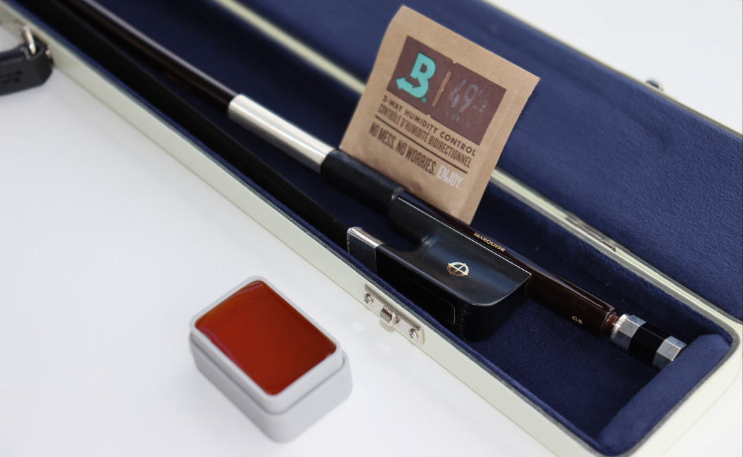 CodaBow Marquise with a humidity pack and a block of rosin