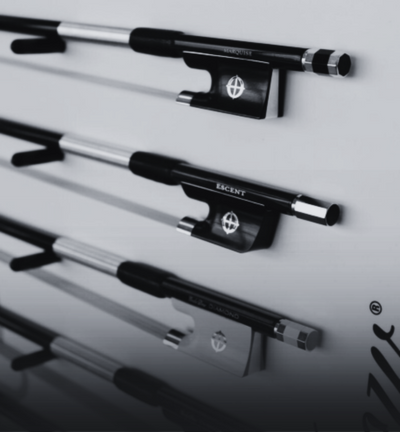 Set of violin bows with 'Excent' branding on a gray background