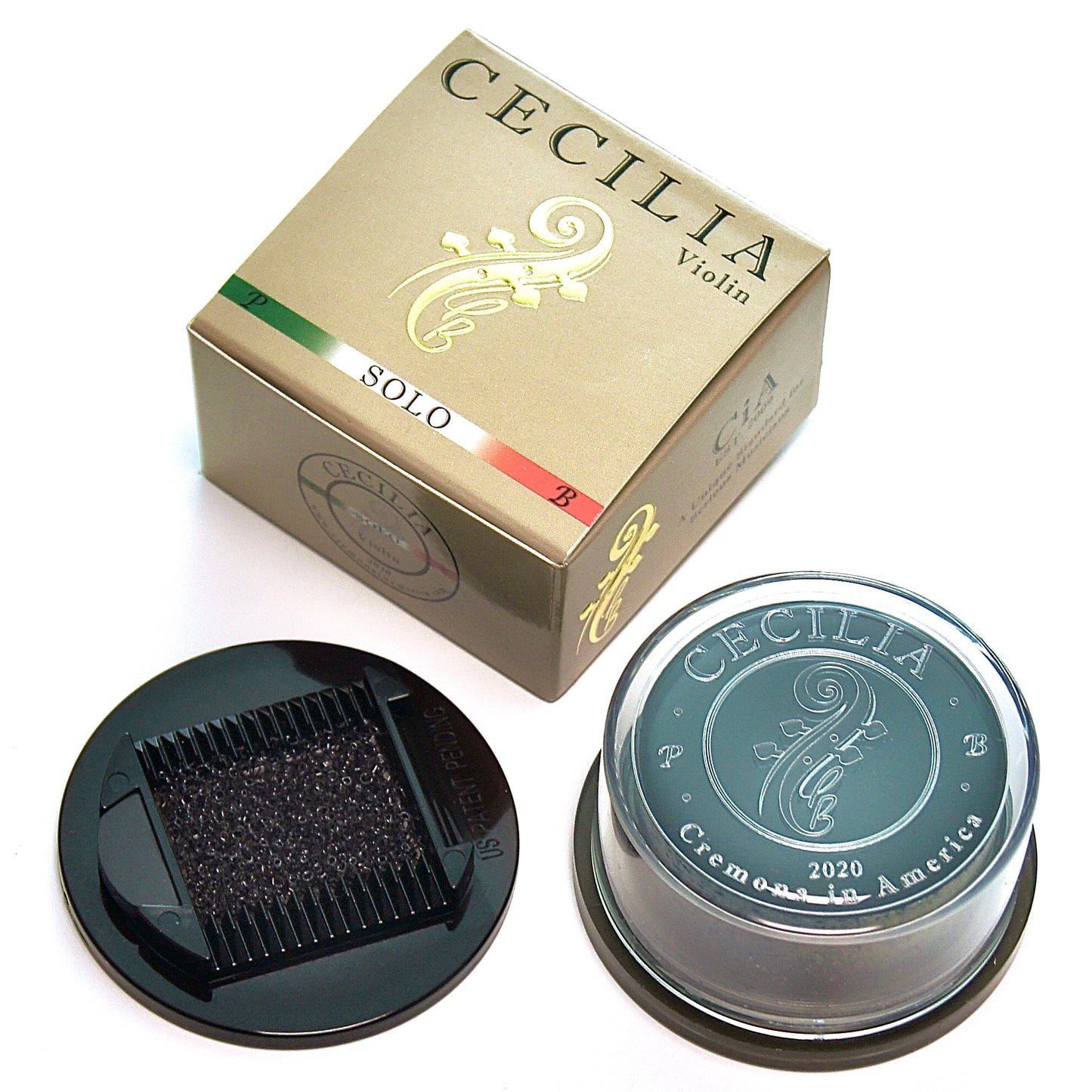Violin rosin, contained in a clear plastic container with a black base, sits next to its gold and green box. The box is labeled "CECILIA Violin SOLO".