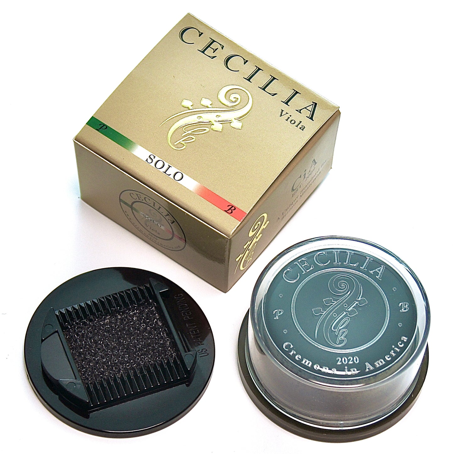 Viola rosin, contained in a clear plastic container with a black base, sits next to its gold and green box.  The box is labeled "CECILIA Viola SOLO".